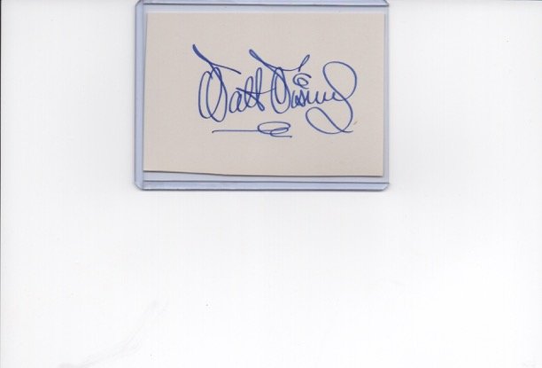 WALT DISNEY.: An autograph from Walt Disney. Walt Disney was an American motion-picture and television producer and showman, famous as a pioneer of cartoon films and as the creator of Disneyland.