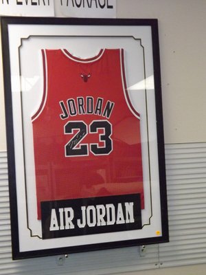 Michael Jordan Autographed Jersey. Framed Chicago Bulls: Michael Jordan Autographed Jersey. Framed Chicago Bulls #23 Basketball Jersey, Signed in the "2" in "23" with "Air Jordan" Laser-Matte. Appraised or estimated retail value $4000. COAs by Sport Memory