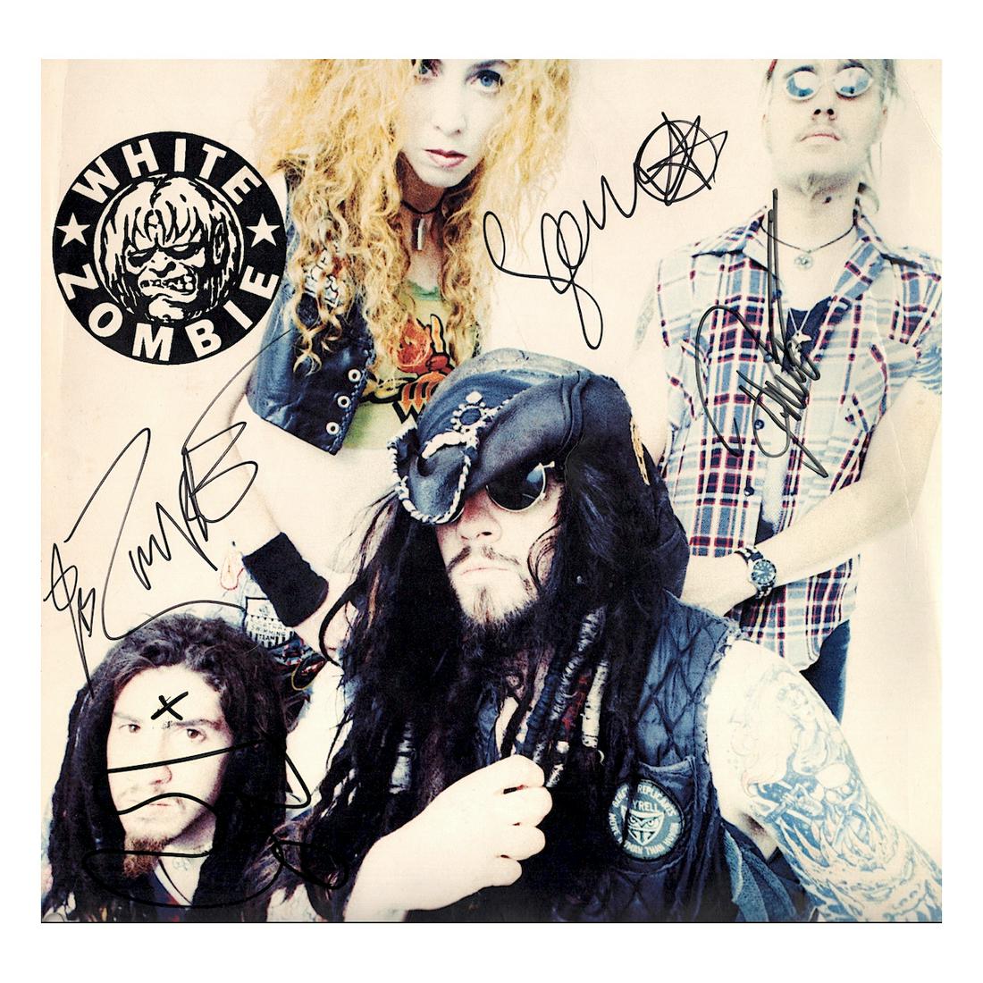 White Zombie - La Sexorcisto - Autographed LP Flat: WHITE ZOMBIE (American Heavy Metal Band) Authentic Autographed White Zombie 'La Sexorcisto: Devil Music Volume One' Album Flat. Signed by Rob Zombie, Jay Yuenger, Sean Yseult and Ivan de Prume in blac
