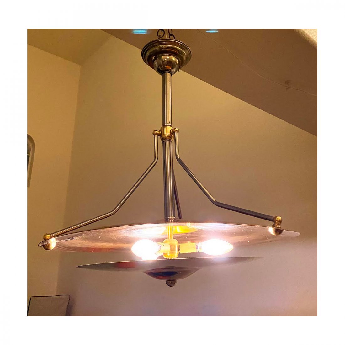 Hard Rock Hotel - Zildjian Symbol Ceiling Lamp: An original custom hanging chandelier light from the now closed Hard Rock Hotel & Casino in Las Vegas. These were used in the hallways throughout the casino. Quality craftsmanship with age and patina