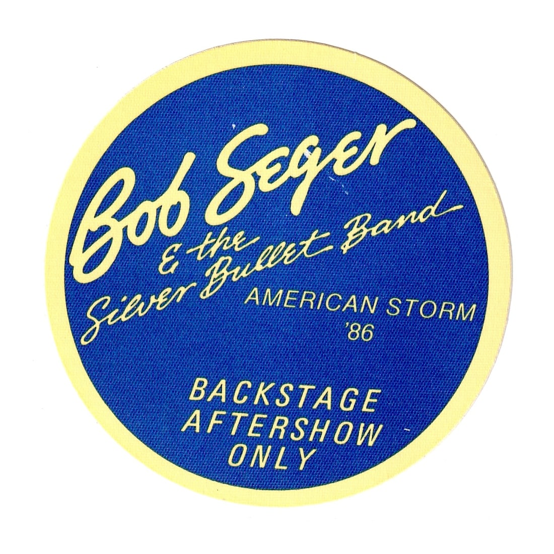 Bob Seger - American Storm Tour - 1986 Backstage Pass: BOB SEGER (American Singer-Songwriter) Authentic 1986 American Storm Tour Unused After Show Backstage Pass. Manufactured By: OTTO Includes COA. Dimensions: 3 3/4 inches round Shipped Flat Shipping can
