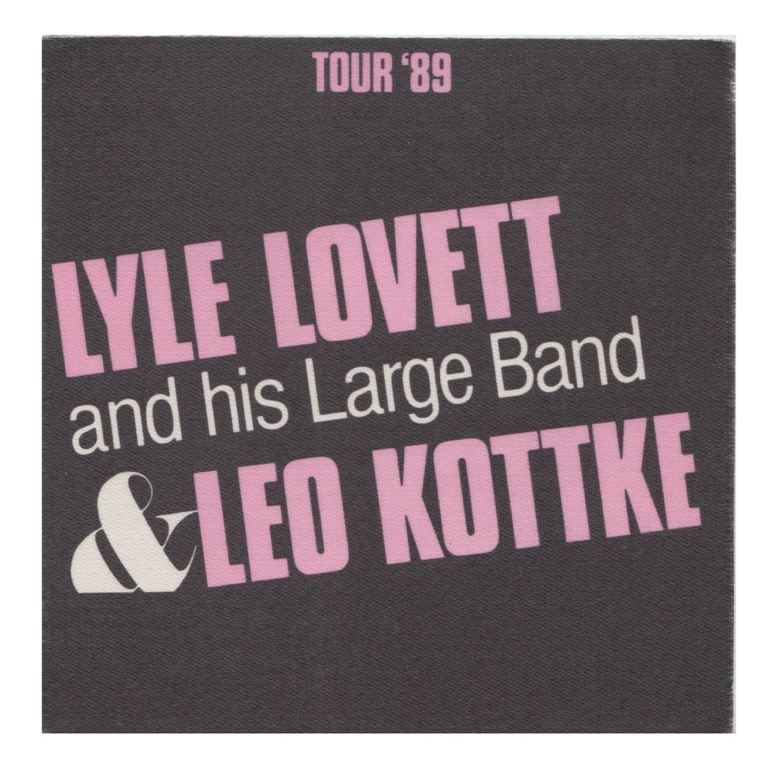 Lyle Lovett - 1989 Tour - Backstage Pass: LYLE LOVETT (American Country Singer) Authentic 1989 Tour Unused Backstage Pass . Manufactured By: StarLiner Includes COA. Dimensions: 4 1/4 inches by 4 1/4 inches Shipped Flat Shipping can be combine