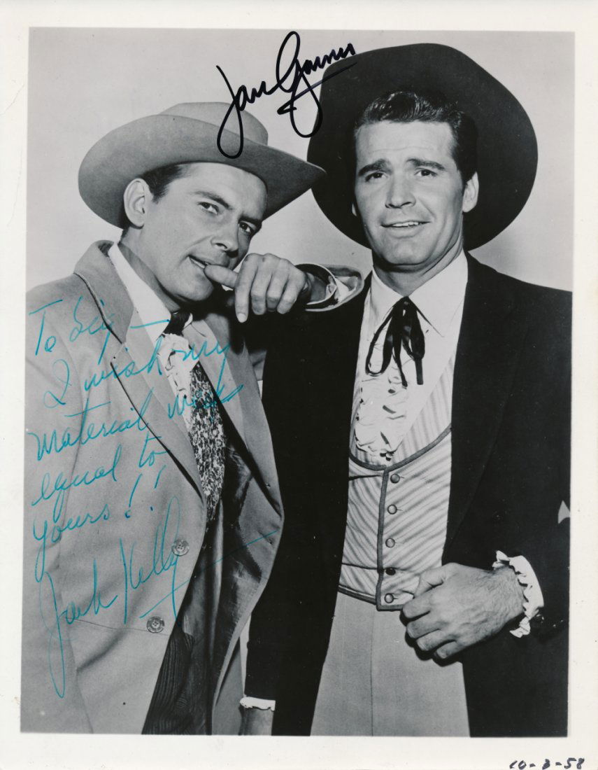 James Garner & Jack Kelly Autographed Photograph: James Garner & Jack Kelly Autographed 'Maverick' Publicity Photograph Signed by James Garner in black felt tip pen & Jack Kelly in green felt tip pen Includes COA Dimensions: 8 inches by 10 inches Exc