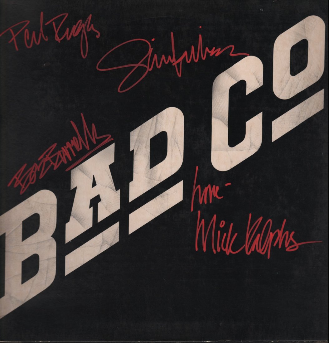 Bad Company Autographed LP: Bad Company Autographed "Bad Co" LP Signed in red felt tip pen: Paul Rodgers, Mick Ralphs, Boz Burrell, and Simon Kirke Excellent Condition From The Estate of Jim Barbour Jr. Includes COA Dimensions: 