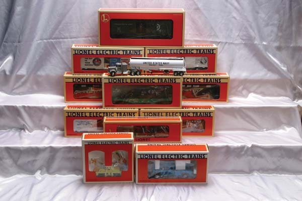 Lionel Freight Cars 16429 WM hopper 2-pack, 16686: 16429 WM hopper 2-pack, 16686 Mickey and Bad Pete animated boxcar, 16720 LL extension searchlight car, 16927 NYC flat car with gondola, 18424 LL on-track pick-up truck, 18425 Goofy and Pluto hand car,