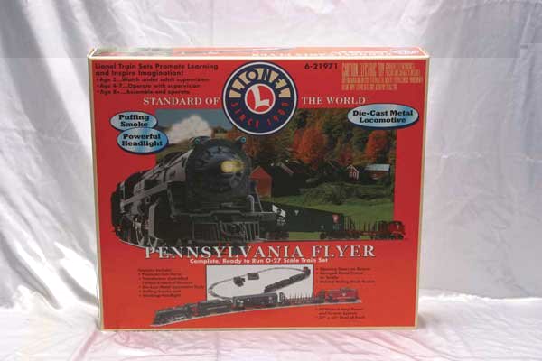 Lionel Train Sets 21971 PRR Flyer freight set, 61: 21971 PRR Flyer freight set, 61234 Holiday battery operated Christmas set [Note: Only one set shown.] Gauge: O-27/G Item Quality: Q1 Box Quality: B2