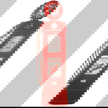 1259- TEXACO FIRE CHIEF GAS PUMP: 80 inches in height.Presented here is a 1940s era tall base Martin & Schwartz computer pump restored in Texaco Fire Chief trim. This is a very presentable example featuring a reproduction globe.