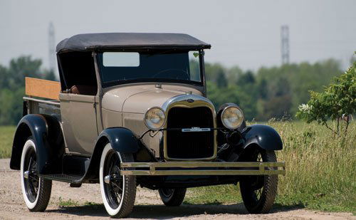 1929 Ford Model A Roadster Pickup: 40bhp, 200.5 cu. in. inline four-cylinder engine, three-speed manual transmission, solid front and rear axles with transverse leaf springs, and four-wheel mechanically operated drum brakes. Wheelbase: