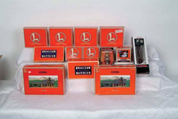 Lionel Accessories 5530 remote uncoupling track,: 5530 remote uncoupling track, 12888 railroad crossing flasher, 12899 searchlight tower, 12912 oil pumping station, 14111 1531R controller, (4) 22934 Mainline die-cast walkout cantilever signal, (2) 22