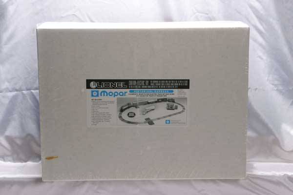 Lionel Train Set 11818 Chrysler Mopar freight set: 11818 Chrysler Mopar freight set. Gauge: O-27 Item Quality: Q1 Box Quality: B1