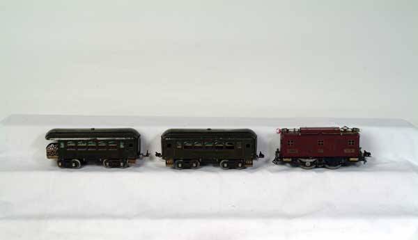 Lionel Train Set 350 LL passenger set including: 350 LL passenger set including: maroon # 8 electric locomotive, 35 NYC olive green pullman, 36 NYC olive green observation. (Prewar) Gauge: STND Item Quality: Q3 Box Quality: B5