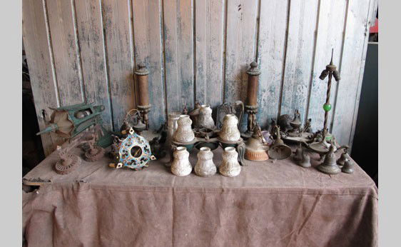 Electric Lamps: Lot consists of electric lamps including illuminated Christmas tree stand, elaborate cast iron porch light, several ceiling fixtures, two mica lamps, and a group of 6 match glass shades.