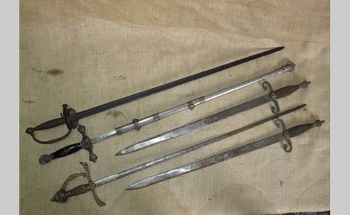 Swords: Five antique swords suitable for d?cor purposes.