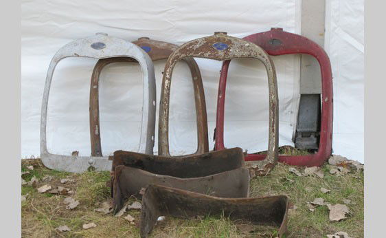 Ford Model A Parts: 1928-29 Model A parts including four radiator shells and three radiator splash aprons.