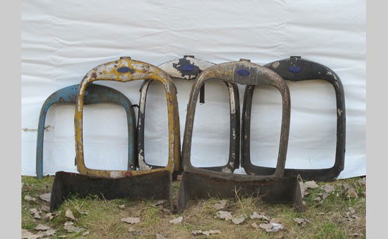 Ford Model A Parts: 1928-29 Ford Model A parts including five radiator shells and two radiator splash aprons.