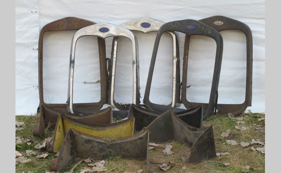 Ford Model A Parts: 1930-31 Ford Model A parts including five radiator shells and five radiator splash aprons.