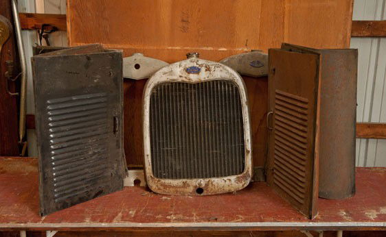 1928-1929 Ford Model A Parts: 1928-29 Ford Model A radiator with shell, 2 radiator shells, and 2 hoods.