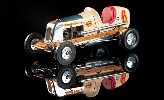 1940 Bunch Speed Demon: OFFERED WITHOUT RESERVE A unique rail track racer that appears to have never been run. Displays the number 6 livery of the Bunch/Brown Special and Champion Spark Plugs. Features a leather seat, polish