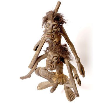 0101- Original Tiki Statue "Iron Dick Mike": Wooden fertility statue composed of two tiki figures sitting on top of one another, from the Steve McQueen hangar.