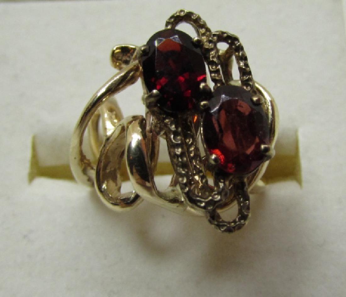 3CT GARNET RING 14K GOLD FREEFORM DESIGNER: HUGE CUSTOM DESIGN 20MM WIDE TOP MOUNTED WITH 2 OVAL RED GARNETS 3 CARATS TOTAL. WEIGHS 6.5 GRAMS OF 14K YELLOW GOLD. SIZE 5. (USA SHIPPING $10)