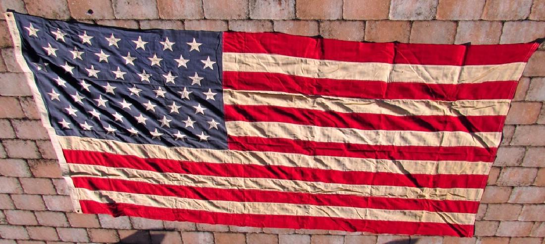 US 49 STAR FLAG COTTON 5 1/4' x 9 1/2': US 49 STAR FLAG. 2x2 PLY COTTON BUNTING. VALLEY FORGE FLAG CO.