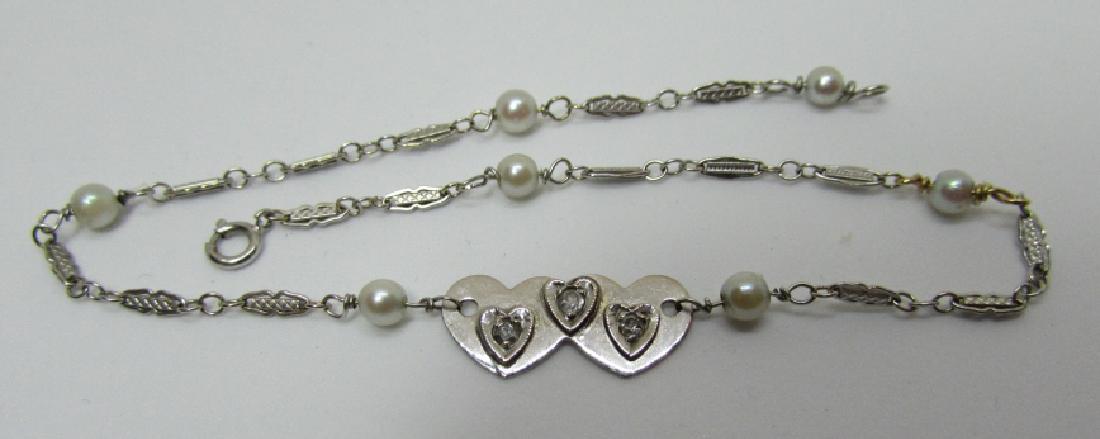 DIAMOND PEARL ANKLET 14K GOLD ANKLE BRACELET 9 1/4: VINTAGE ESTATE PLAQUE LINK CHAIN WITH GENUINE PEARL & DIAMOND ACCENTS. MEASURES 9 1/4 INCHES LONG. WEIGHS 2.6 GRAMS. (USA SHIPPING FOR THIS ITEM IS $8)