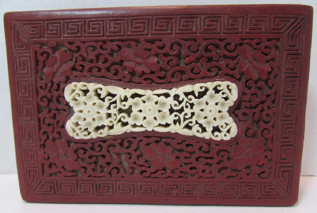 ANTIQUE CHINESE BONE & CINNABAR COVERED BOX: Ornately Carved BONE & Cinnabar Lacquer Humidor Case with Black Inside & Base. BONE 3" x 1" Perfect. Box: W 51/2" x D 3 1/2" x T 1 3/4". Good Condition, Some Corner Chips. IMPORTANT: Bidding may not b