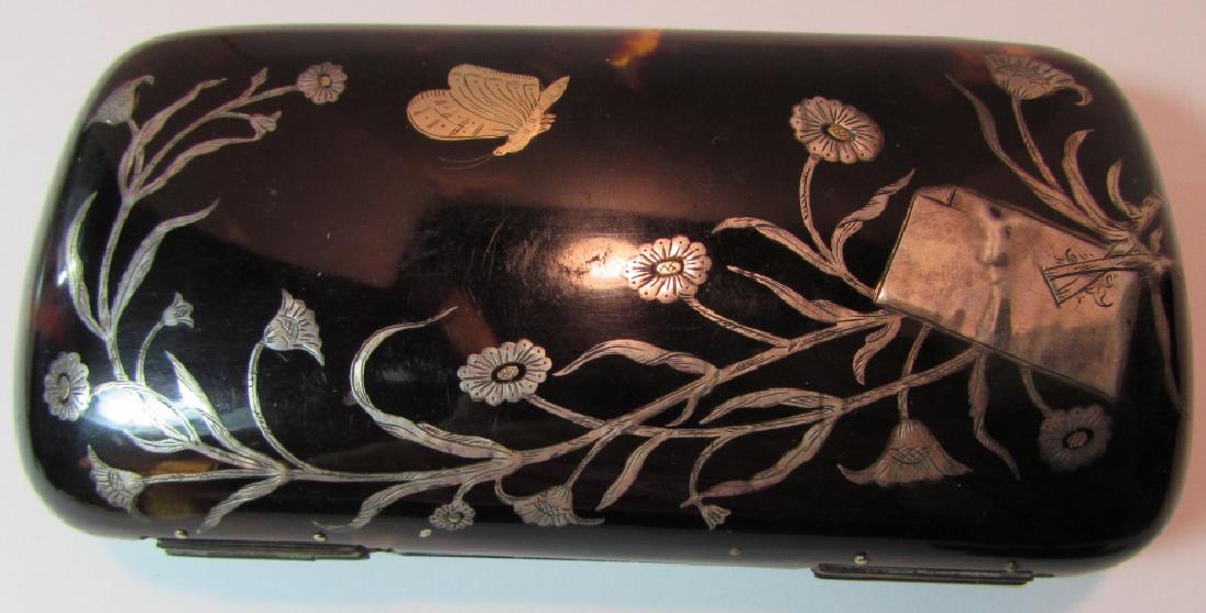 TORTOISE SHELL PURSE GOLD SILVER INLAY CLUTCH CASE: ANTIQUE C1800'S GENUINE GOLD & SILVER INLAID FLORAL TURTLE SHELL BOX FOR CIGARS, GLASSES, CARDS, EVENING BAG. MEASURES 5 1/2 INCH BY 2 3/4 INCH. THERE ARE CHIPS, PLEASE SEE PICTURES. TRULY A WORK OF A