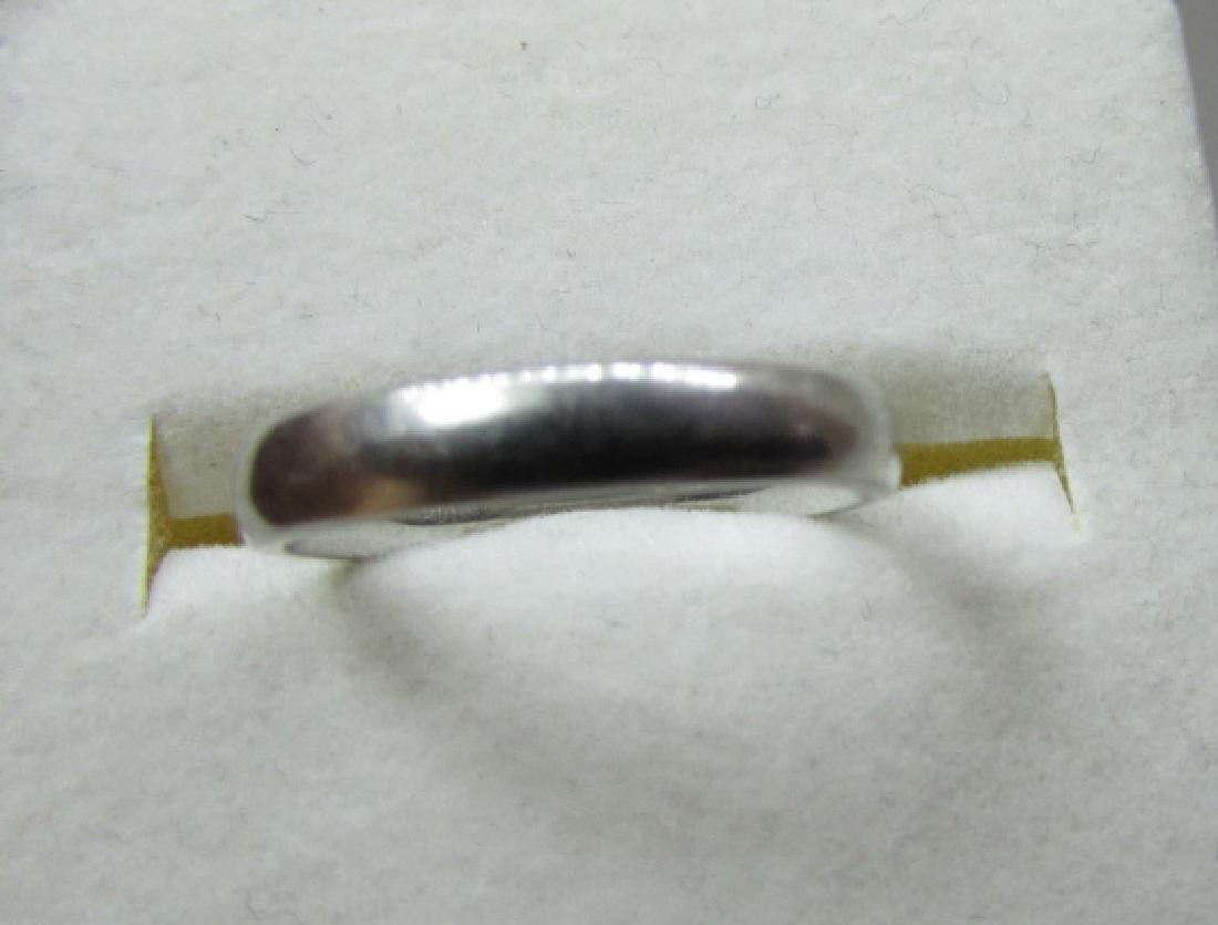 3MM PLATINUM WEDDING BAND RING 4.1 GRAMS: SOLID PLATINUM 3MM WIDE RING. WEIGHS 4.1 GRAMS, SIZE 5. (USA SHIPPING FOR THIS ITEM IS $10)