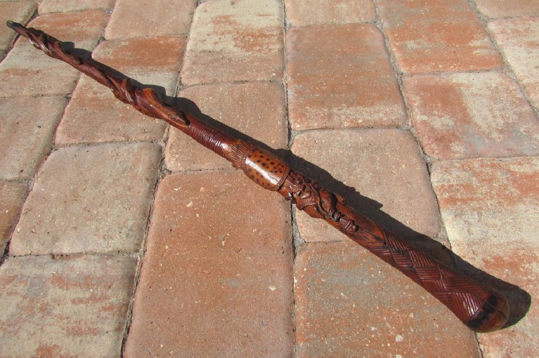 CARVED WOOD WALKING STICK CANE SNAKES EAGLE FOLK: HAND CARVED FOLK ART WOOD CANE w/ EAGLE & SNAKE MOTIF. 33.25" TALL.