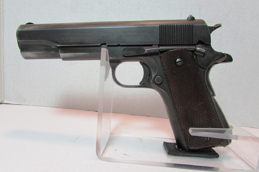 1944 COLT 1911 A1 ARMY US PROPERTY MILITARY PISTOL: 1944 COLT 1911A1 .45 ACP HAND GUN. US ARMY PROPERTY. Ser. #1693057