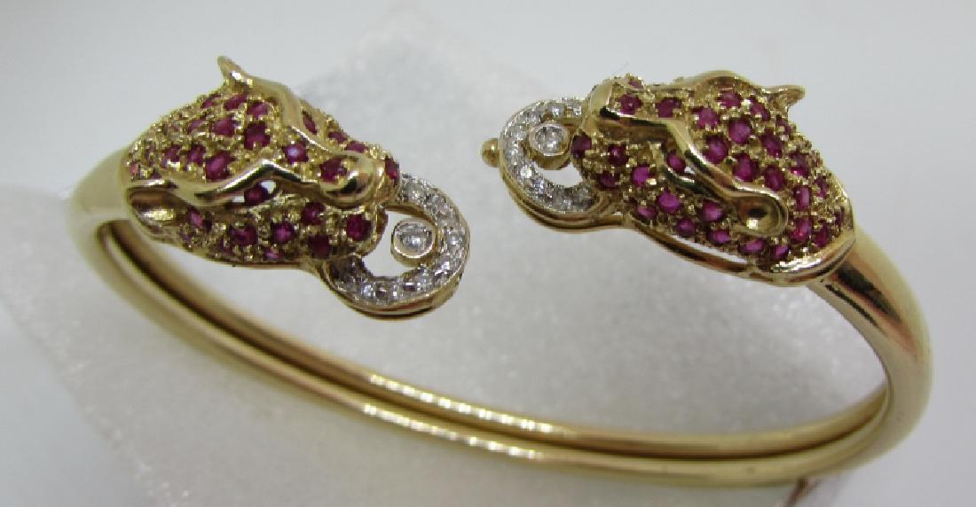 RUBY DIAMOND PANTHER BRACELET 14K GOLD BANGLE: FABULOUS 10MM WIDE 100+ GEMSTONE ENCRUSTED IN 14K YELLOW GOLD 16.2 GRAMS. ADJUSTABLE TO FIT SMALL TO LARGE WRISTS 6"-8". EXCELLENT CONDITION. (USA SHIPPING $15)