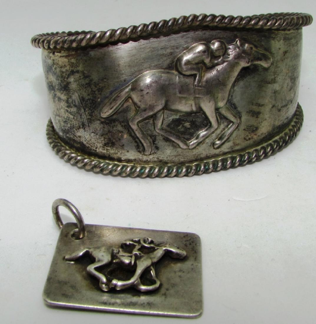 STERLING SILVER HORSE RACING BRACELET PENDANT: MATCHING SET STERLING SILVER CUFF BRACELET & PENDANT/KEYCHAIN. BRACELET 3" WIDE, 1.5" TALL; ADJUSTABLE. PENDANT 1 1/8" WIDE. TOGETHER WEIGH 52.8 GRAMS.