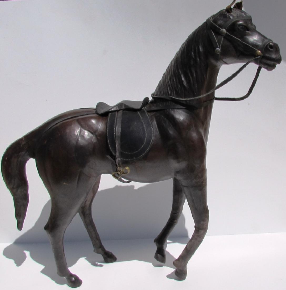 FULL LEATHER HORSE STATUE FIGURE SADDLE EQUESTRIAN: LARGE LEATHER HORSE STATUE. 21" TALL, 20" LONG, 6.5" WIDE.