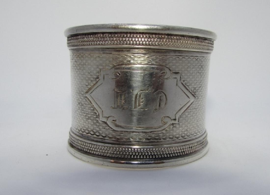 STERLING SILVER NAPKIN RING ANTIQUE HAND ENGRAVED: 1 3/8" TALL, 1 13/16" WIDE. WEIGHS 34.3 GRAMS. EXCELLENT CONDITION, OVER 100 YEARS OLD. MONOGRAM PLEASE SEE PICTURE. TESTED STERLING SILVER, NO HALLMARK. (USA SHIPPING $8)