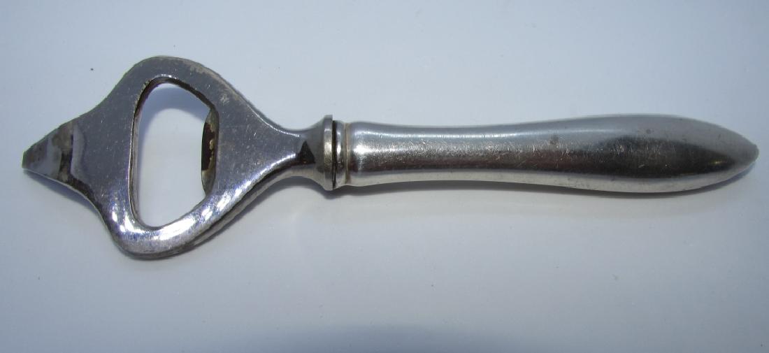 GORHAM STERLING SILVER CAN BOTTLE OPENER VINTAGE: MARKED GERMANY METAL HEAD WITH MARKED GORHAM STERLING HANDLE. 6 1/8" LONG, WEIGHS 61.9 GRAMS OVERALL. (USA SHIPPING $6)