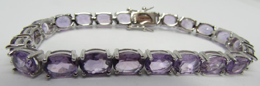 30CT AMETHYST BRACELET STERLING SILVER: PURPLE GEMSTONE TENNIS LINK MEASURES 7.25 INCHES LONG. WEIGHS 16.3 GRAMS. ALL EXCELLENT CONDITION. (USA SHIPPING $8)