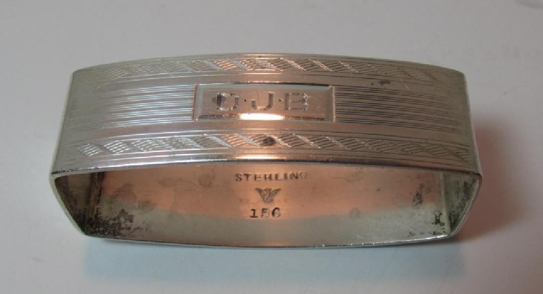 NAPKIN RING STERLING SILVER THE MERRILL SHOPS #156: ANTIQUE HALLMARKED ARTS & CRAFTS ENGRAVED HOLDER. MEASURES 2 1/4 INCH. WEIGHS 24 GRAMS. (USA SHIPPING $8).