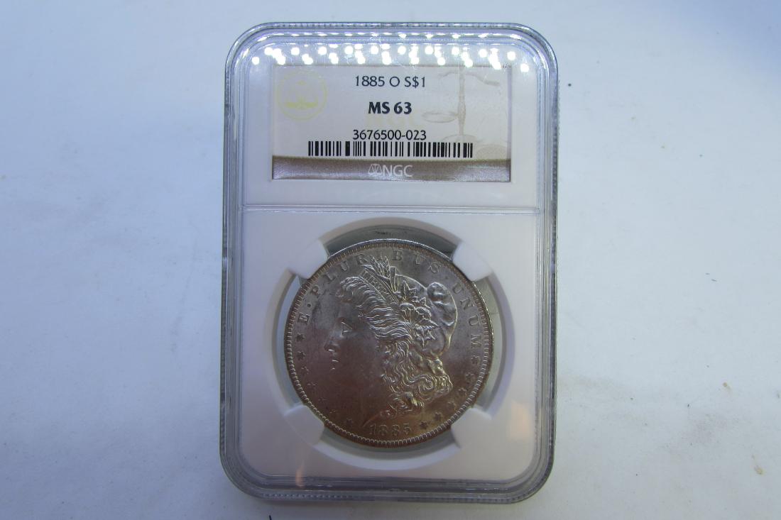 1885 O MORGAN SILVER DOLLAR MS 63 NGC (1 of 2)