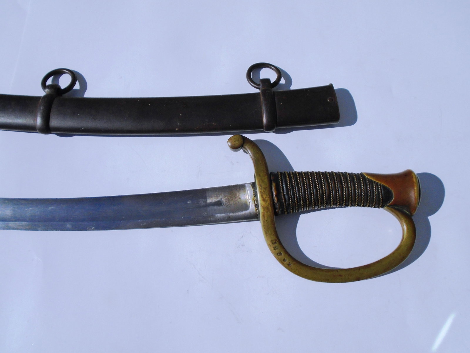 CIVIL WAR SABER SWORD CONFEDERATE CNS CUTLASS: CONFEDERATE NAVY SWORD & SCABBARD. 31.5" BLADE, 37" OVERALL (MEASURED FLAT, NOT FOLLOWING CURVE). MARKED "163**"(US SHIPPING $25)