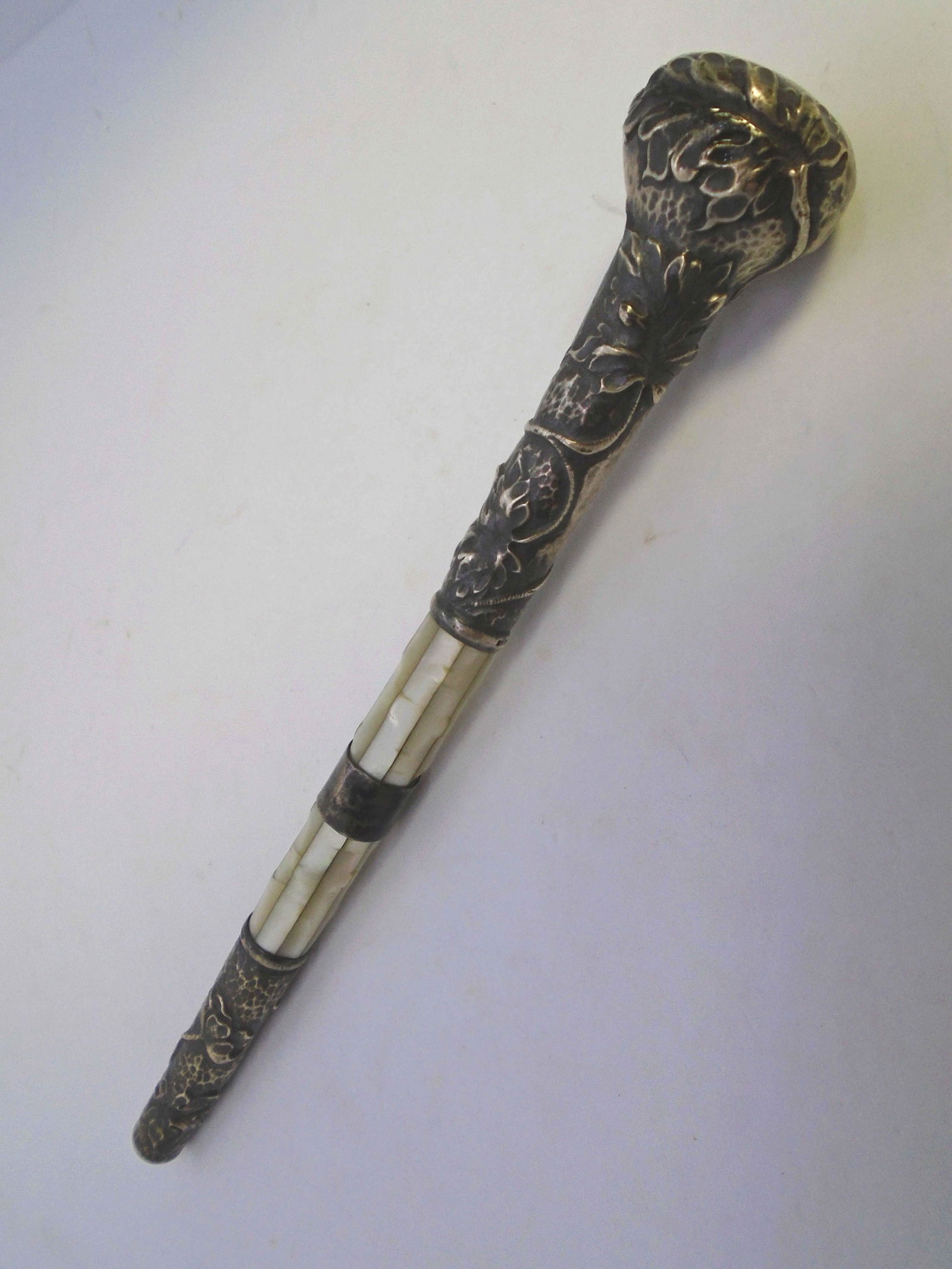 STERLING SILVER MOTHER OF PEARL CANE PARASOL: ANTIQUE MOPHANDLE FOR WALKING STICK OR UMBRELLA. 8.75" TALL, 1.25" WIDE. REPOUSSE MARKED STERLING.(US SHIPPING $10)
