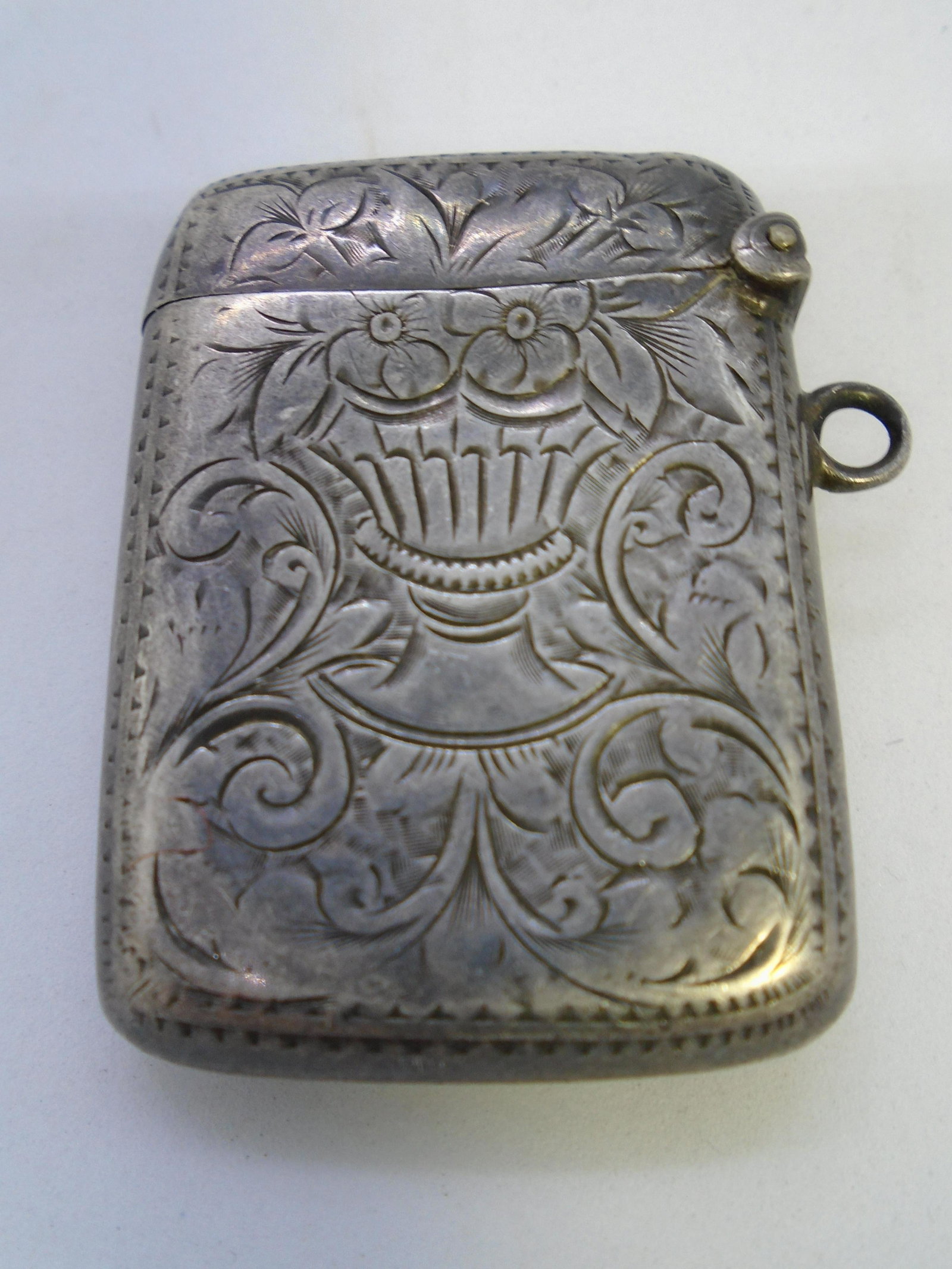 MATCH SAFE VESTA CHATELAINE CASE STERLING SILVER: ANTIQUE VICTORIAN ENGLISH HALLMARKED "J.G (JOHN GILBERT 1868). BIRMINGHAM b" HAND ENGRAVED FLORAL BOX. MATCHSAFE HAS NO MONOGRAM. 35MM BY 46MM BY 10MM. 22 GRAMS. GREAT USED CONDITION, PLEASE SEE ALL P