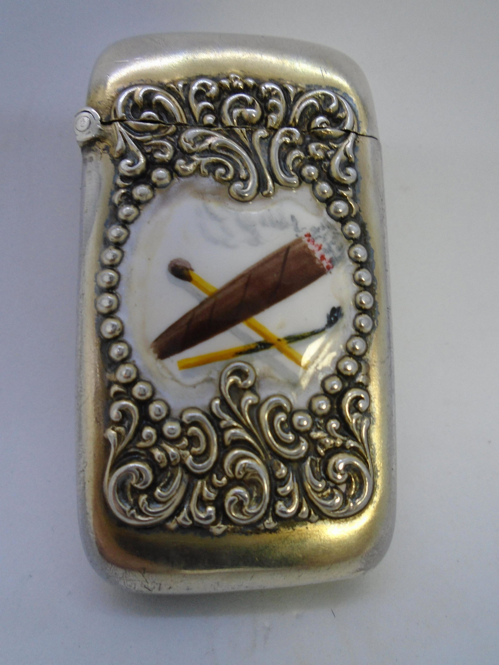 ENAMEL MATCH SAFE VESTA BOX CASE STERLING SILVER: CIGAR SMOKER DESIGN ANTIQUE VICTORIAN AMERICAN HALLMARKED "STERLING RS" REEVES & SILLCOCKS NY 1896 REPOUSSE BOX. MATCHSAFE MONOGRAM "PL" 58MM BY 32MM BY 13MM. 21 GRAMS. GREAT CONDITION, PLEASE SEE ALL