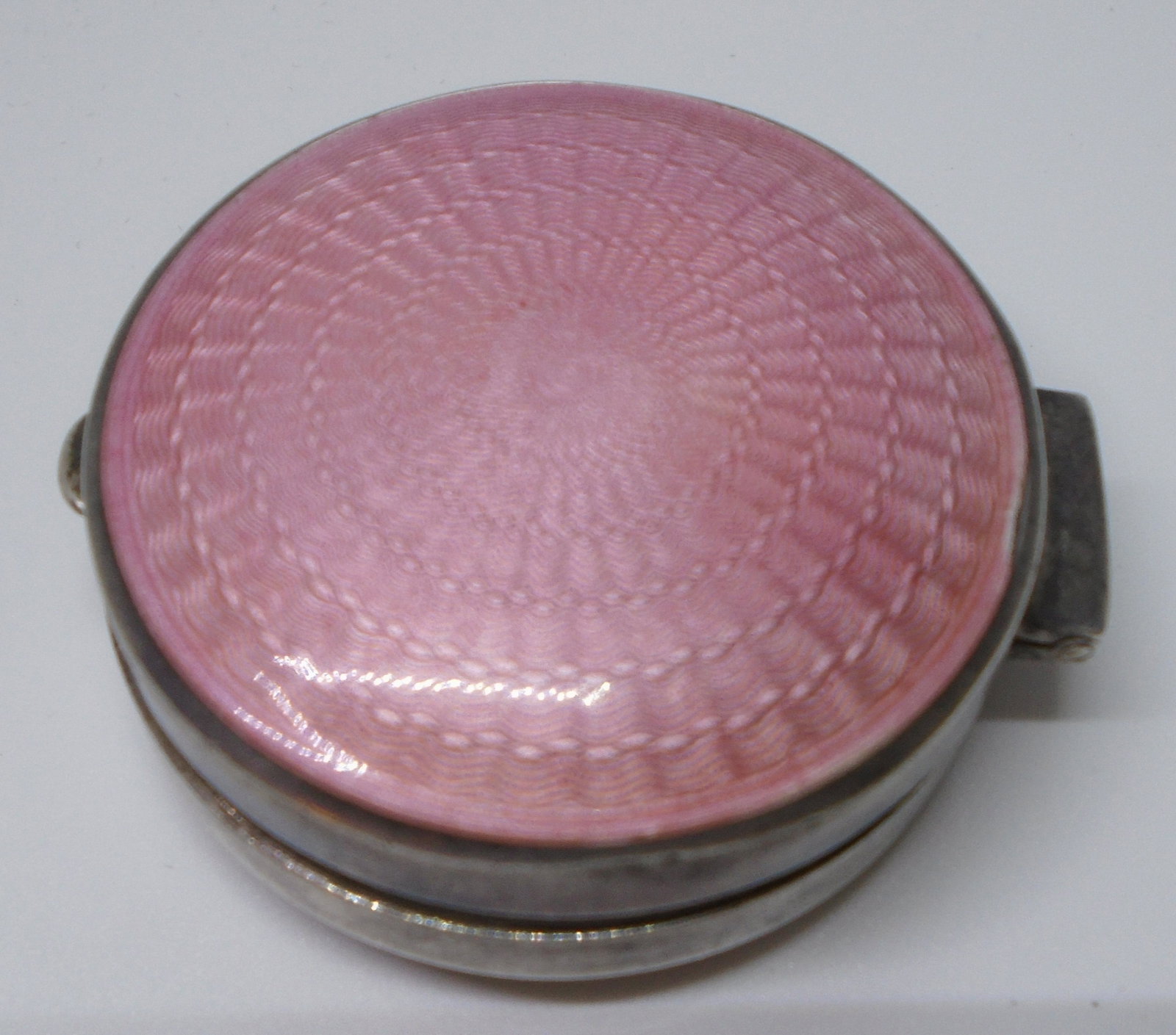 PINK GUILLOCHE STERLING SILVER ENAMEL COMPACT BOX: ANTIQUE ESTATE HALLMARKED CHATELAINE OR VANITY ACCESSORY. MEASURES 39MM ACROSS. WEIGHS 22 GRAMS. EXCELLENT USED CONDITION. (US SHIPPING $10)