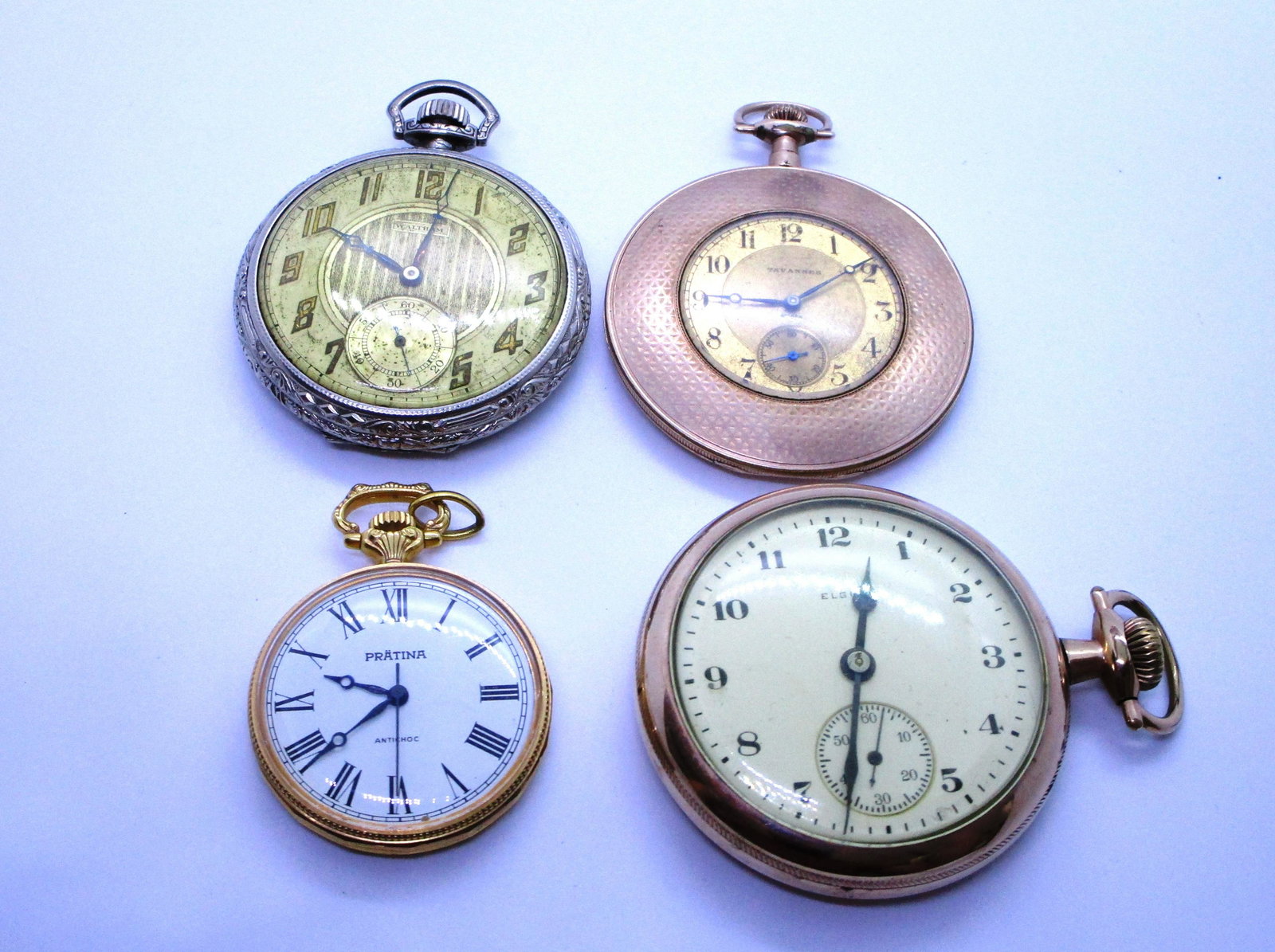 4 OPEN FACE POCKETWATCHES ANTIQUE & MODERN: ELGIN 1920 MOVEMENT, CASE 49MM BY 65MM. WALTHAM 1933 MOVEMENT, CASE 44MM BY 56MM. PRATINA, CASE 33MM BY 45. TAVANNES SWISS,CASE 46MM BY 61MM. FOUR ALL AS FOUND; AS IS. (USA SHIPPING FREE)