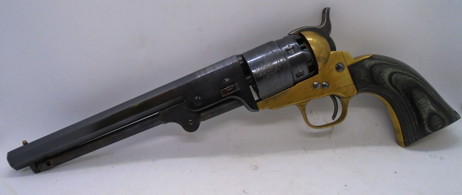 1851 ASM BLACK POWDER 36 CAL REVOLVER HANDGUN: A.S.M. .36 CAL. HAND GUN "PISTOL". 7.5" OCTAGONAL BARREL, ENGRAVED CYLINDER. SER. # (D95789). $30 SHIPPING