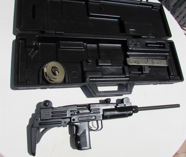 UZI RIFLE & ACCESSORIES IN CASE: UZI SEMI-AUTO .45 ACP CAL .ACTION ARMS MADE IN ISRAEL. LONG GUN w/ SLING, TOOL, FEEDER, MAG, & PLUG IN NICE CASE. 16" BARREL, ADJUSTABLE SIGHTS, COLLAPSIBLE STOCK. SER. (002944) SHIPS TO YOUR FFL DEAL