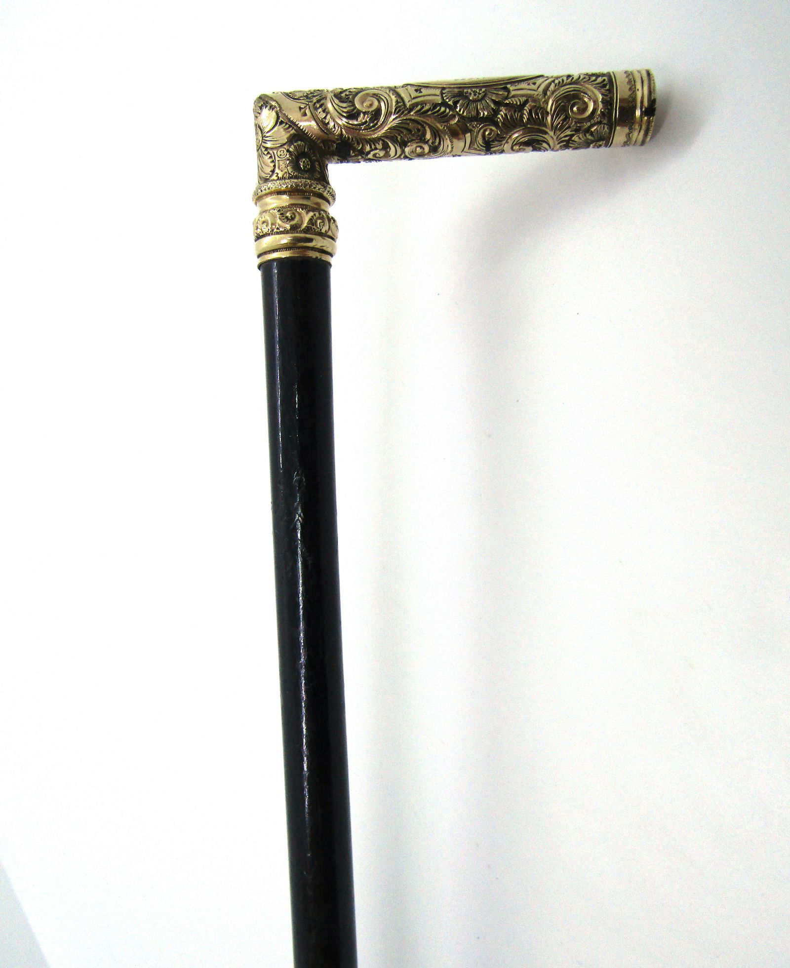 GOLD TOP PRESENTATION CANE EBONY REPOUSSE: 35 5/8" TALL, 2 7/8" WIDE HANDLE. ENGRAVED "BELLA TO WALTER". (USA SHIPPING $30)