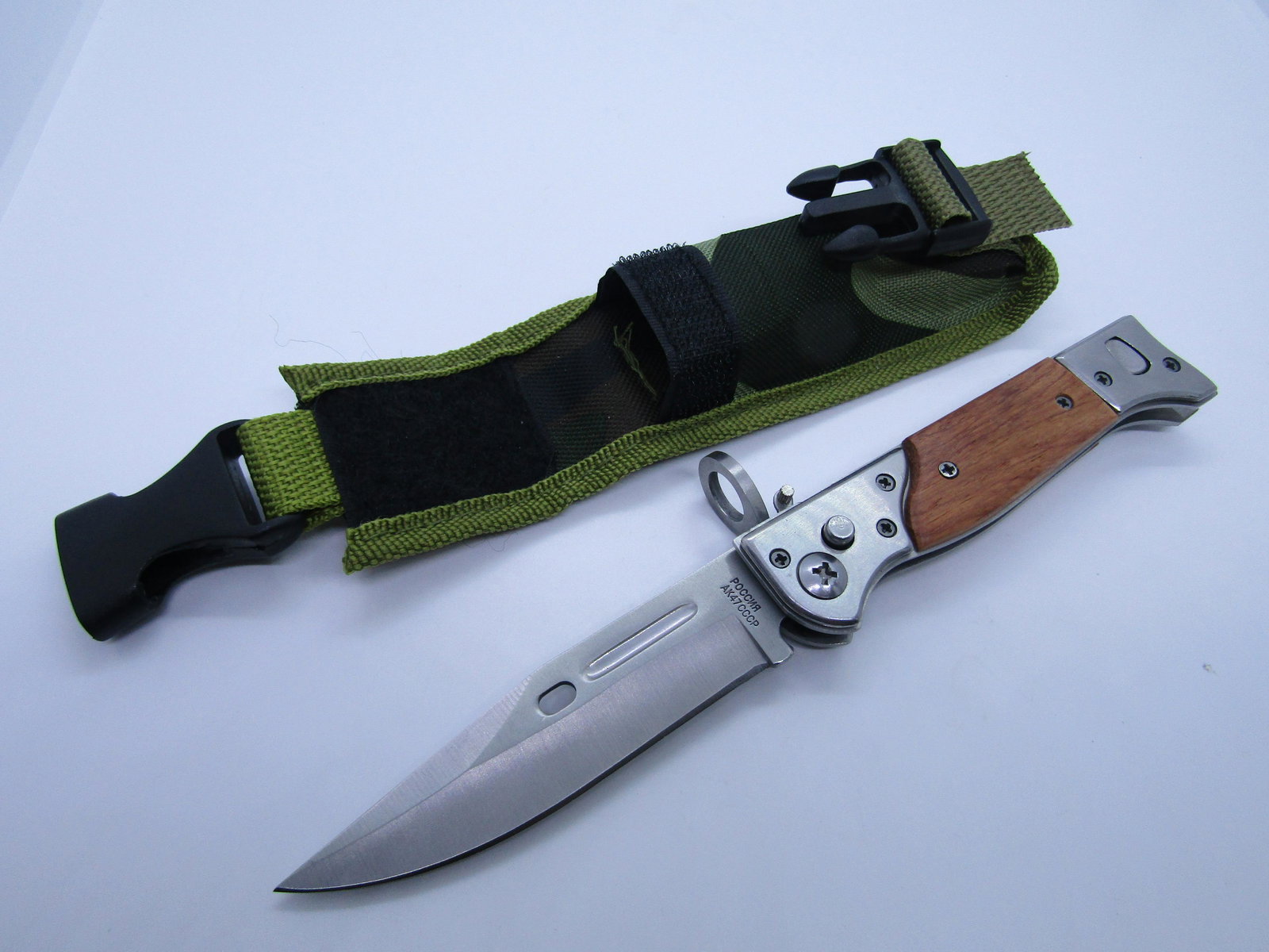 RUSSIAN AK47 SWITCHBLADE KNIFE CCCP: SWITCHBLADE 8 5/8 INCH LONG WITH 3 7/8 INCH BLADE. LIKE NEW CONDITION WITH CASE. WOOD SCALES.. US SHIPPING $6