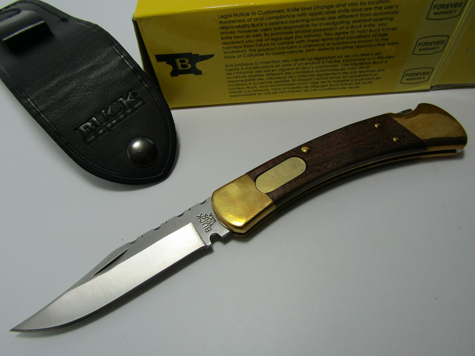 BUCK SWITCHBLADE POCKET KNIFE: BUCK 110 SWITCHBLADE 9" LONG WITH 3 7/8 INCH BLADE. GOOD WORKING. SHIPPING $10